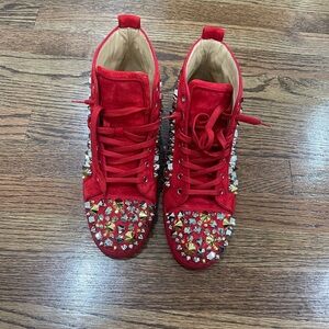 Louboutin red studded sneakers